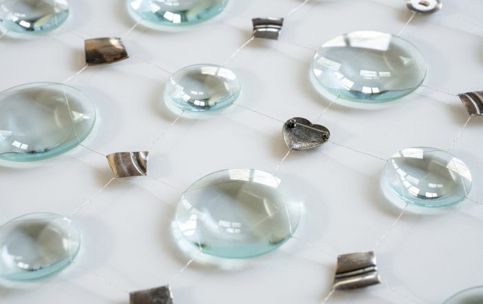Claire BEAUSEIN 'Petrichor' [detail] 2024, Magnifying glasses, fragments of metal, silver wire and bronze rod on museum board, 85 x 152 cm